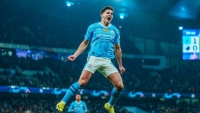 Illustration : "Manchester City : Une performance historique assure la qualification en quarts de finale"